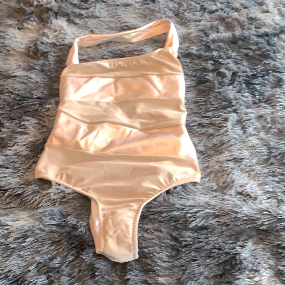 Shiny gold Sports Illustrated Swim one-piece purchased from Venus